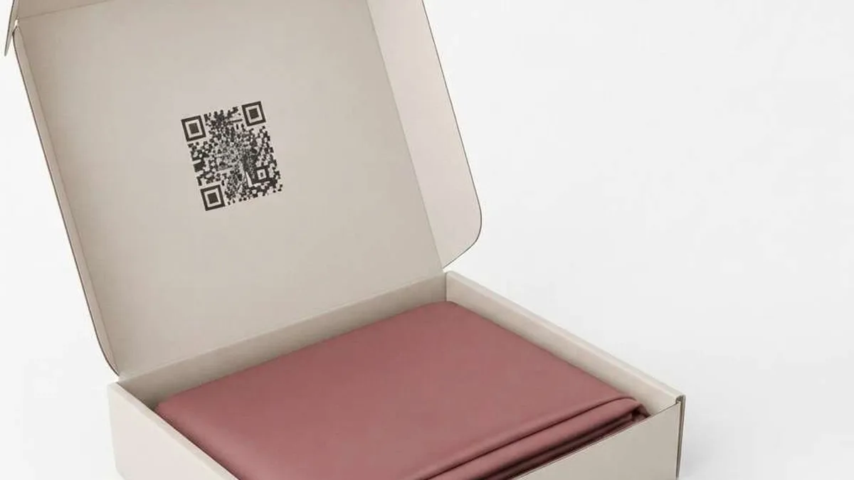 VISIRA gift box, open, with the folded Dusty Rose pillowcase set. Design rendering.